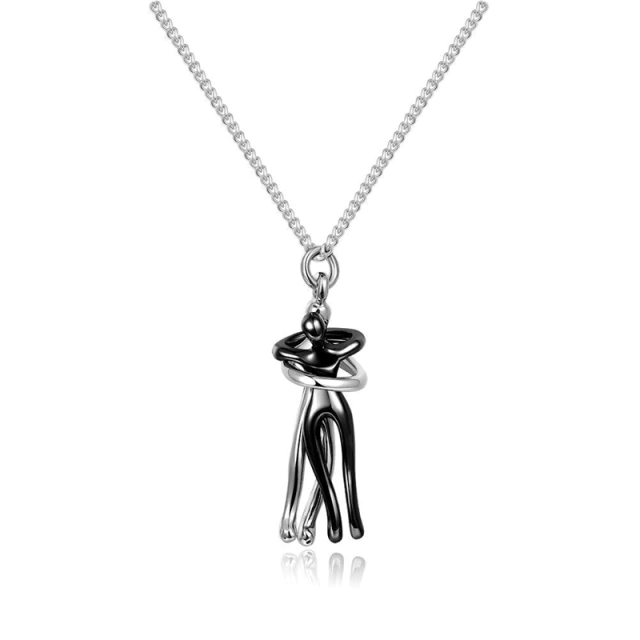 Couple hugging pendant necklace